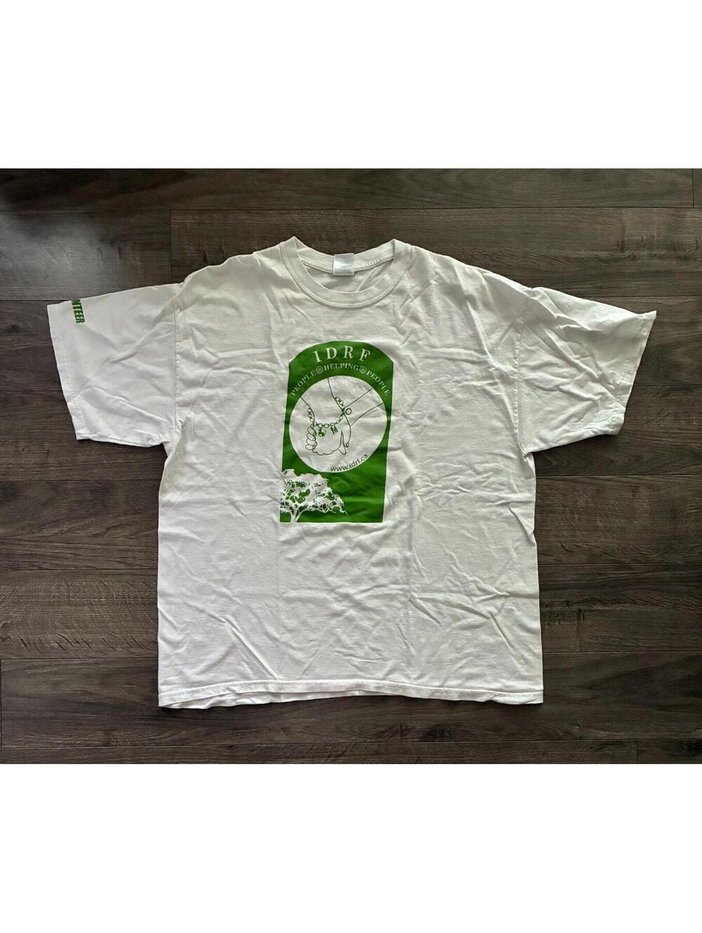 Oversize people helping people volunteer shirt